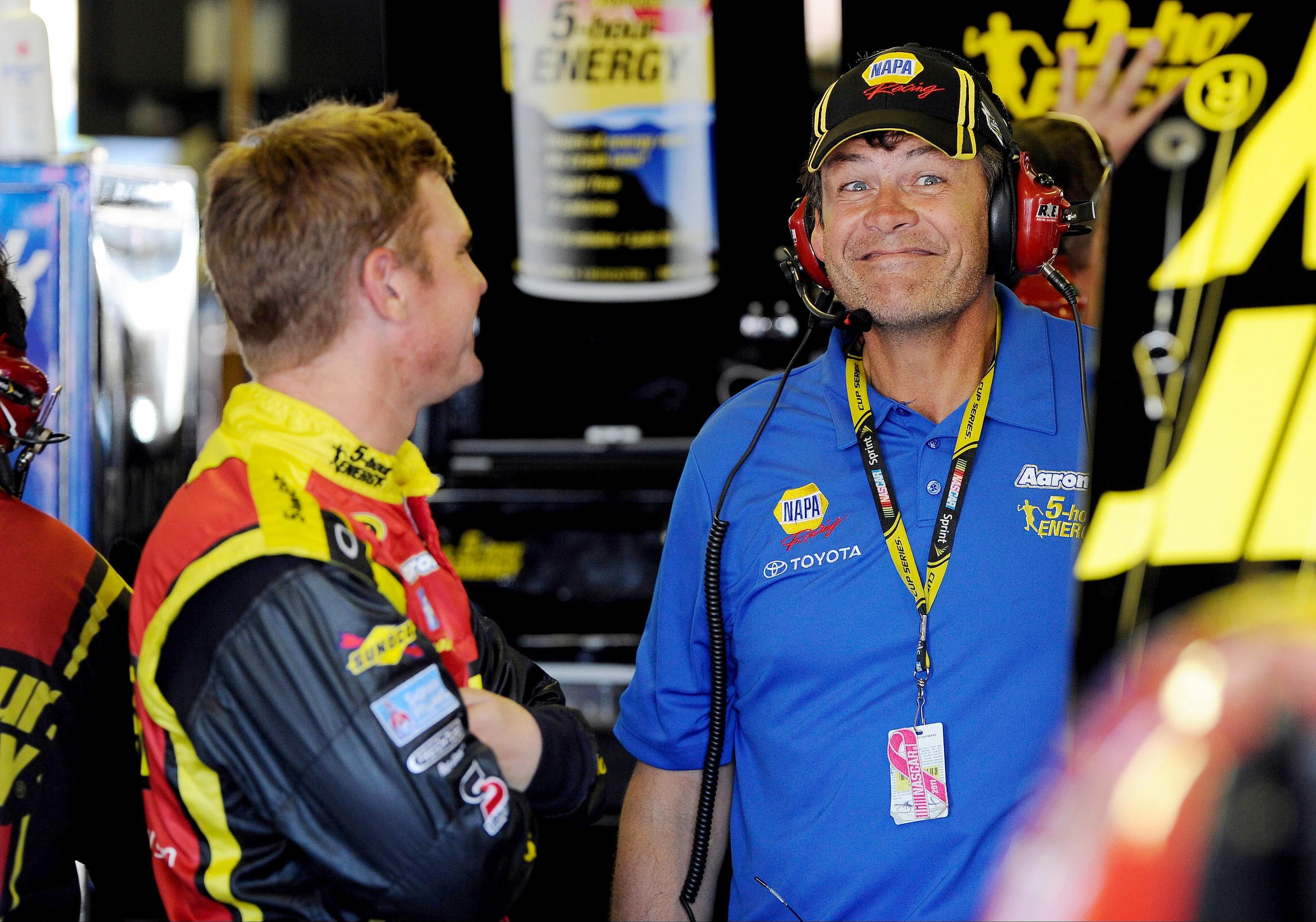 Clint Bowyer (left) talks with Michael Waltrip during AAA Texas 500 practice. Source: Imagn